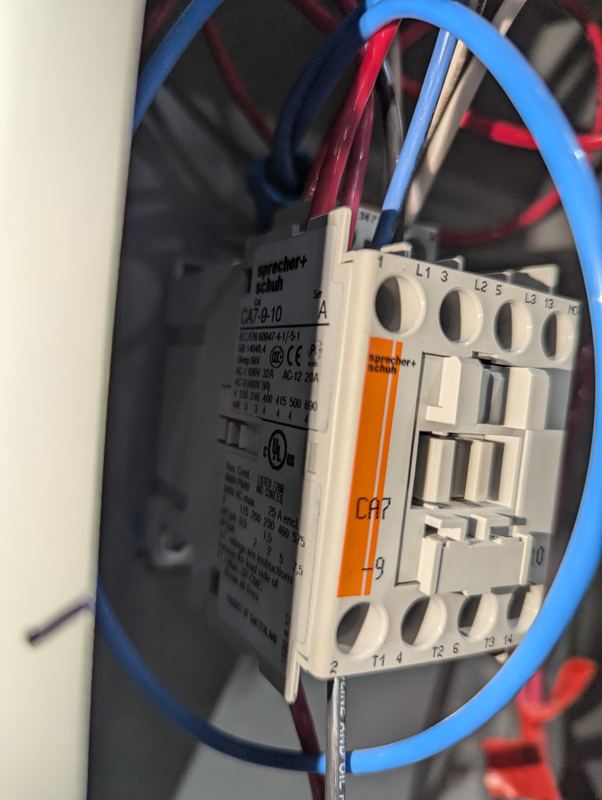 Lighting contactor wired inside a control enclosure for automated lighting control